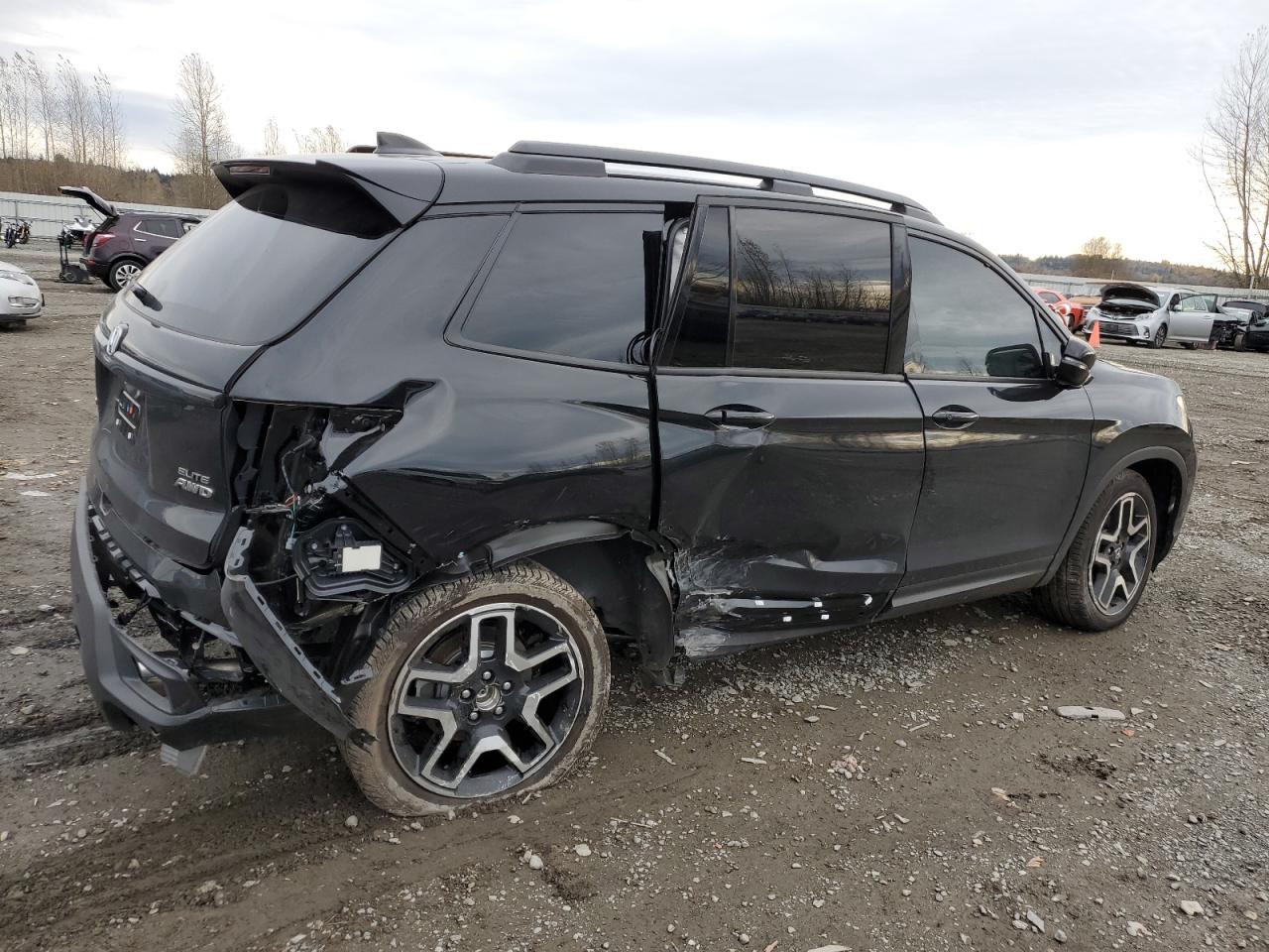 Image 3 of 2023 HONDA PASSPORT ELITE 2023 with VIN 5FNYF8H08PB018584
