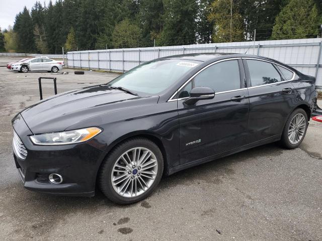 Image 1 of 2014 FORD FUSION SE HYBRID 2014 with VIN 3FA6P0LU8ER337162