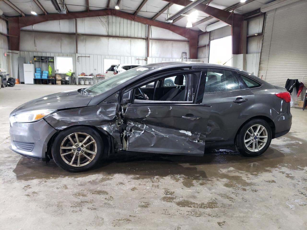 Изображение 1 2015 FORD FOCUS SE 2015 с VIN 1FADP3F2XFL277534