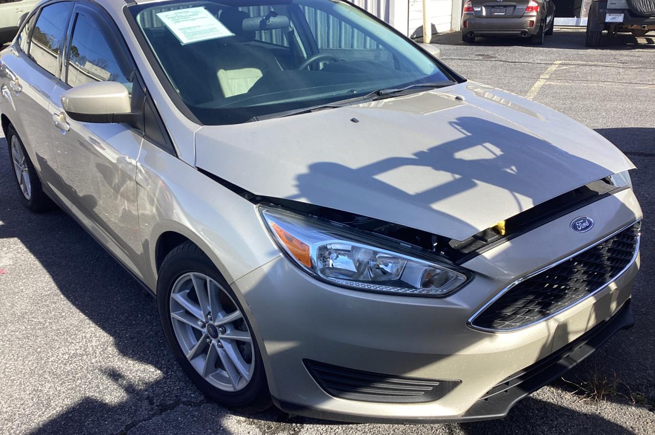 Image 1 of 2018 FORD FOCUS SE 2018 with VIN 1FADP3FE3JL214634