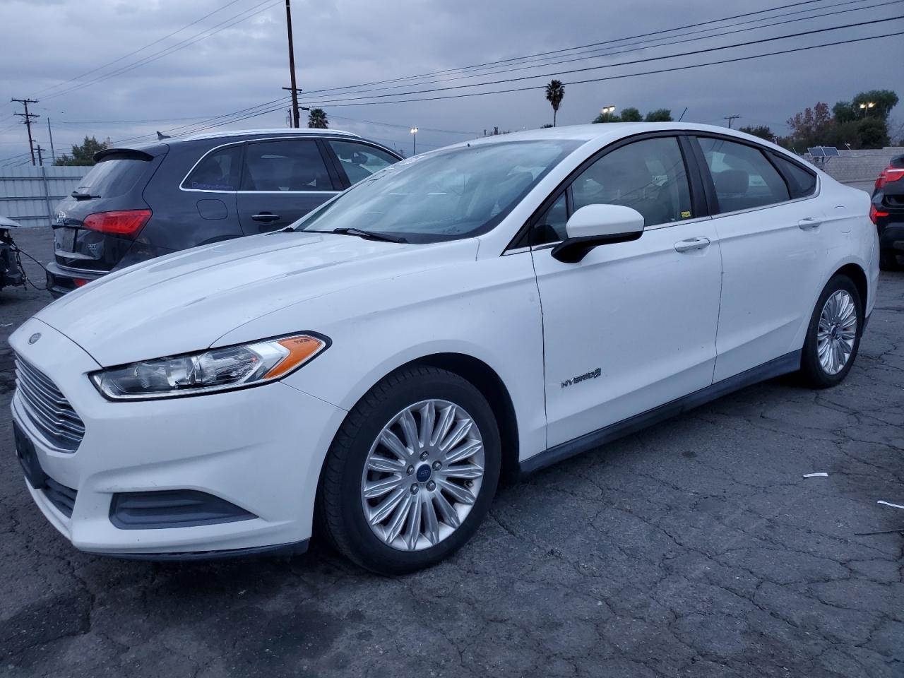 Изображение 1 2016 FORD FUSION S HYBRID 2016 с VIN 3FA6P0UU1GR175697
