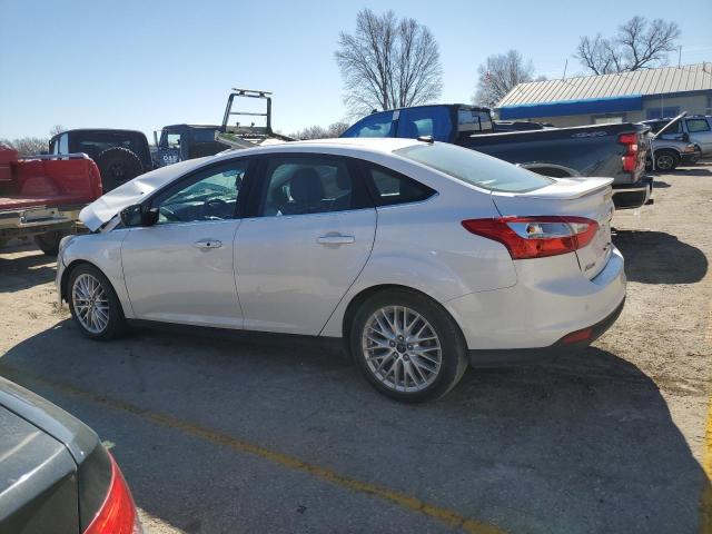 Изображение 2 2014 FORD FOCUS TITANIUM 2014 с VIN 1FADP3J29EL399744