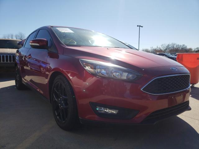 Obraz 1 z 2016 FORD FOCUS SE 2016 z VIN 1FADP3F29GL214281
