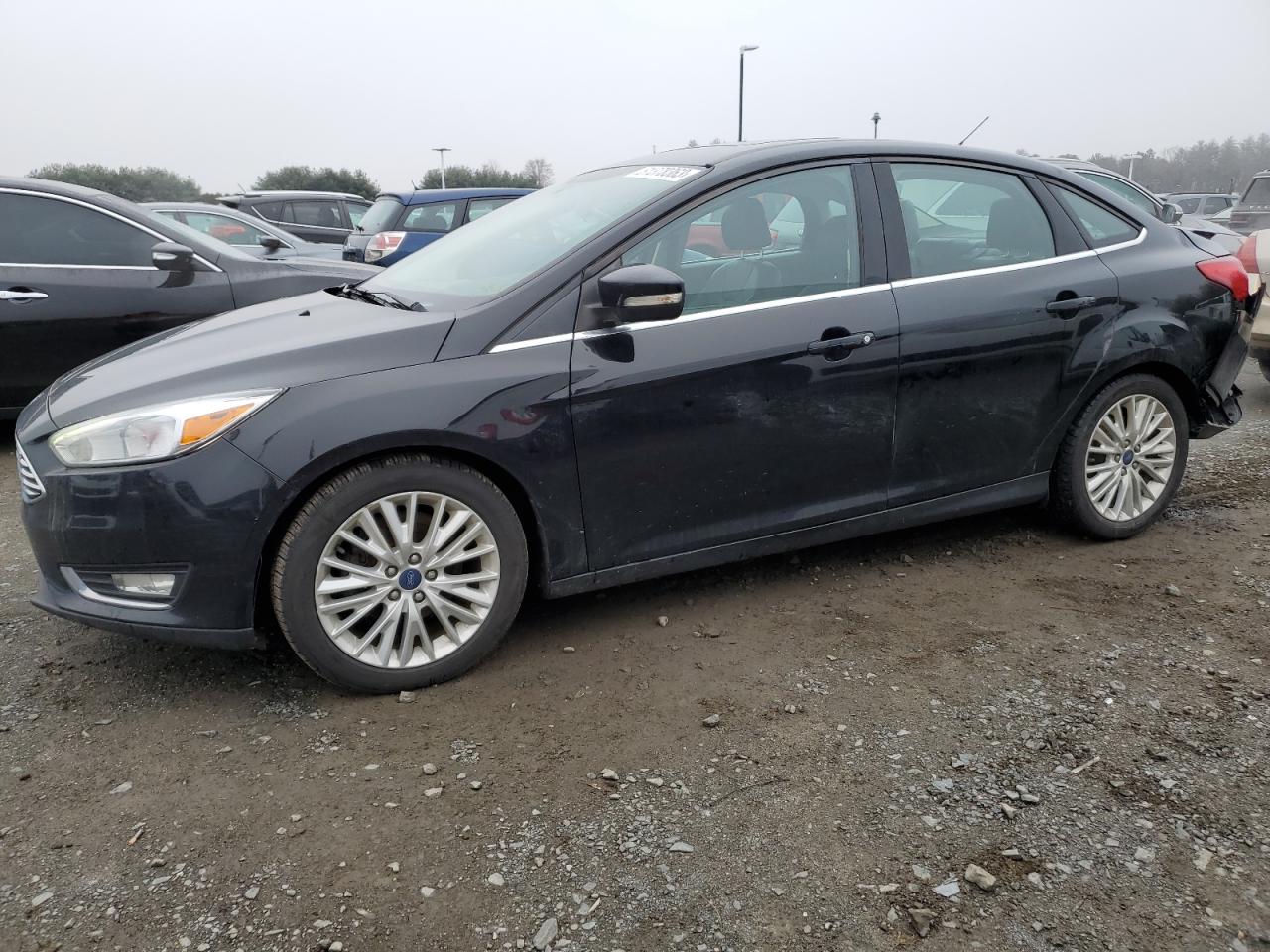 Image 1 of 2018 FORD FOCUS TITANIUM 2018 with VIN 1FADP3J2XJL261575
