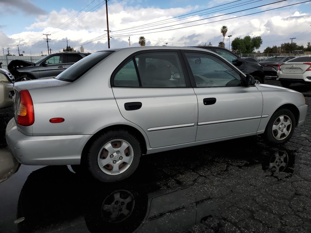 Obraz 3 z 2002 HYUNDAI ACCENT GL 2002 z VIN KMHCG45CX2U380393