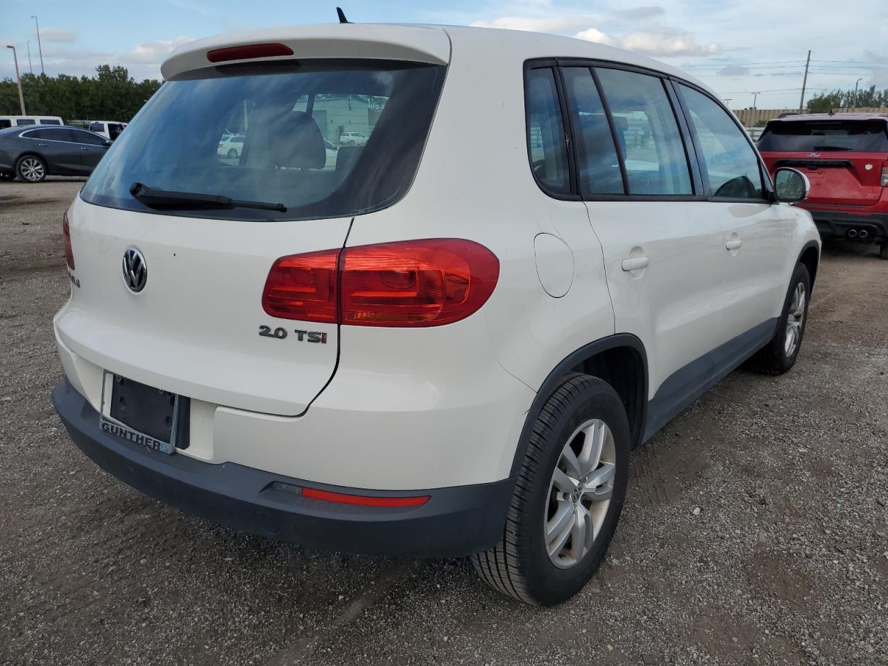 Obraz 3 z 2014 VOLKSWAGEN TIGUAN S 2014 z VIN WVGAV3AX7EW545289