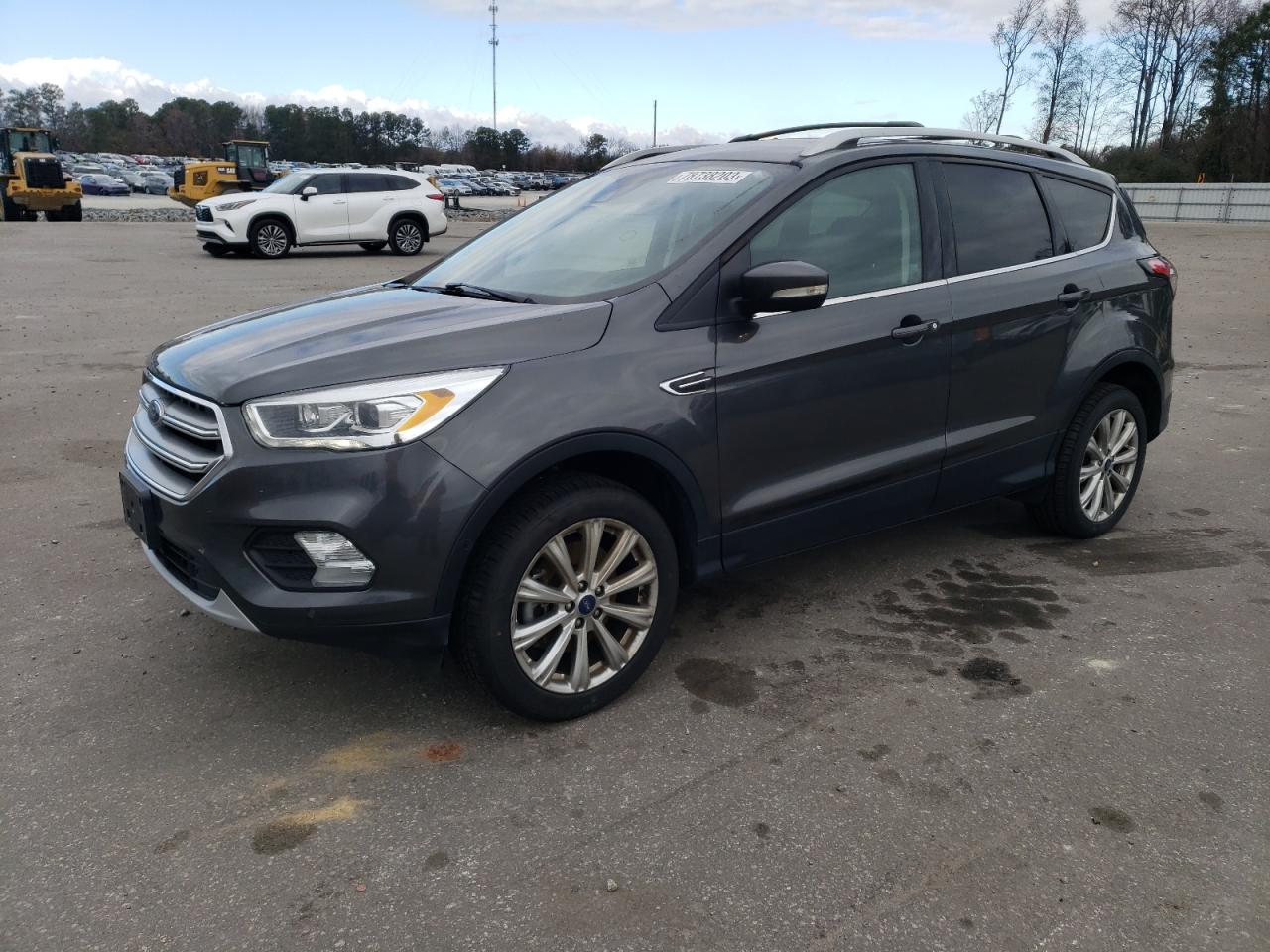 Изображение 1 2017 FORD ESCAPE TITANIUM 2017 с VIN 1FMCU9J94HUF09138