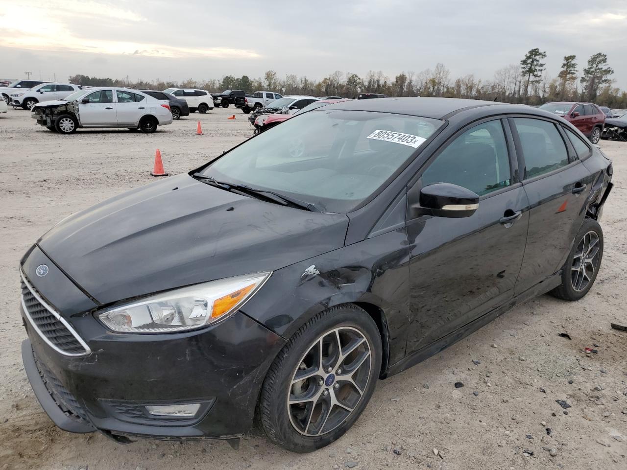 Image 1 of 2016 FORD FOCUS SE 2016 with VIN 1FADP3F21GL225114