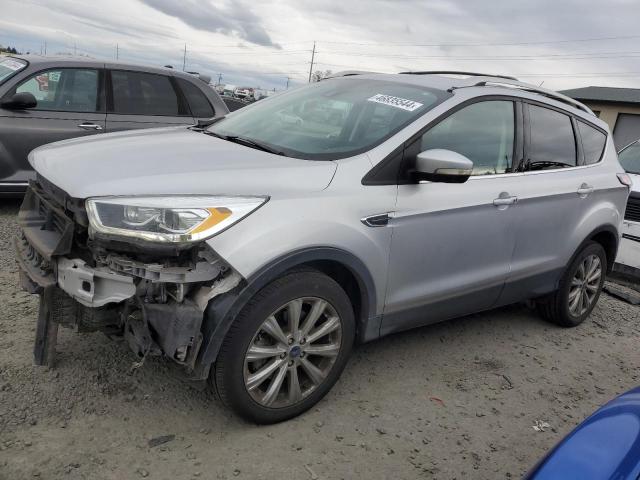 Obraz 1 z 2017 FORD ESCAPE TITANIUM 2017 z VIN 1FMCU9J99HUA15549