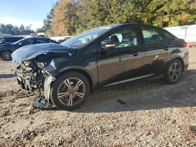 Image 1 of 2014 FORD FOCUS SE 2014 with VIN 1FADP3F20EL147079