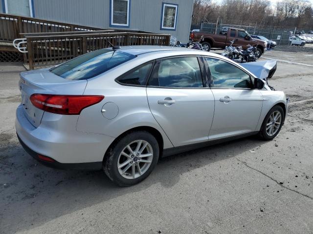 Image 3 of 2018 FORD FOCUS SE 2018 with VIN 1FADP3F28JL295412