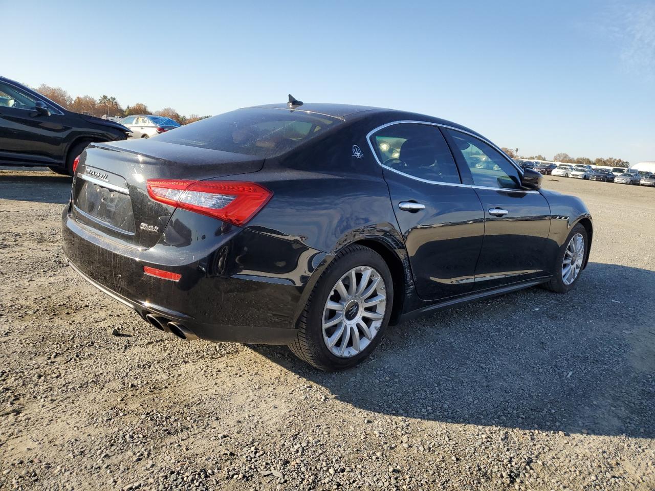 Image 3 of Maserati Ghibli 2015 with VIN ZAM57XSA9F1161459