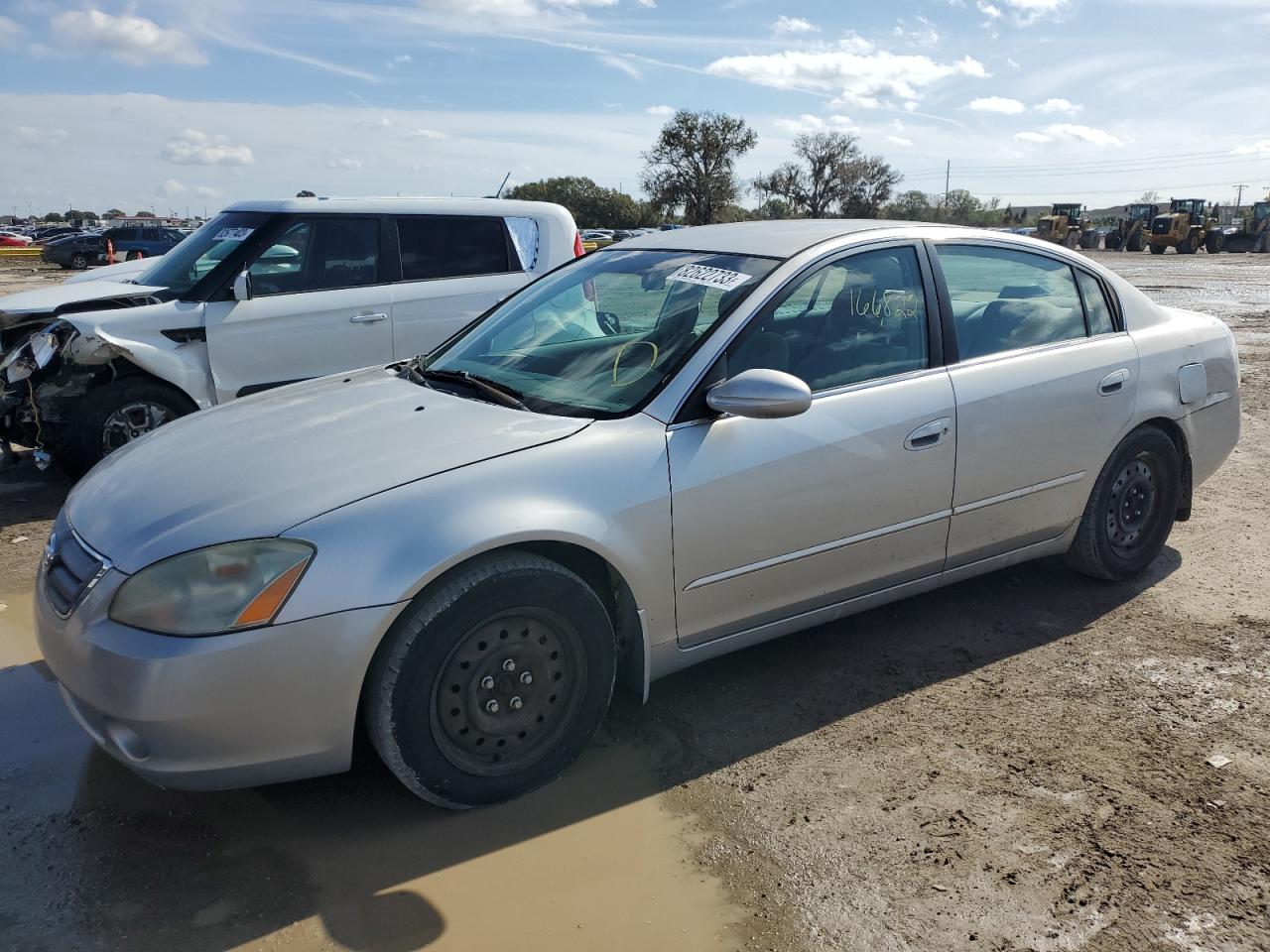 Изображение 1 2003 NISSAN ALTIMA BASE 2003 с VIN 1N4AL11D23C136447