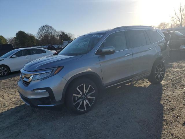 Изображение 1 2020 HONDA PILOT TOURING 2020 с VIN 5FNYF5H65LB010911