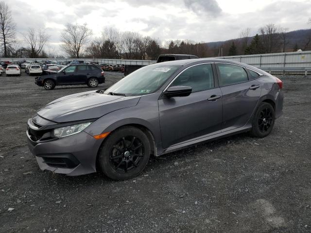 Obraz 1 z 2018 HONDA CIVIC LX 2018 z VIN 19XFC2E56JE002927