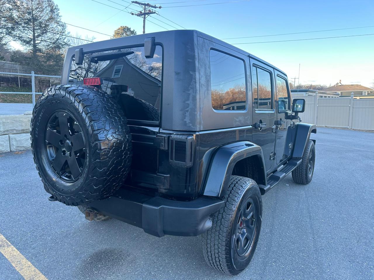 Image 3 of 2010 JEEP WRANGLER UNLIMITED SAHARA 2010 with VIN 1J4BA5H17AL199302