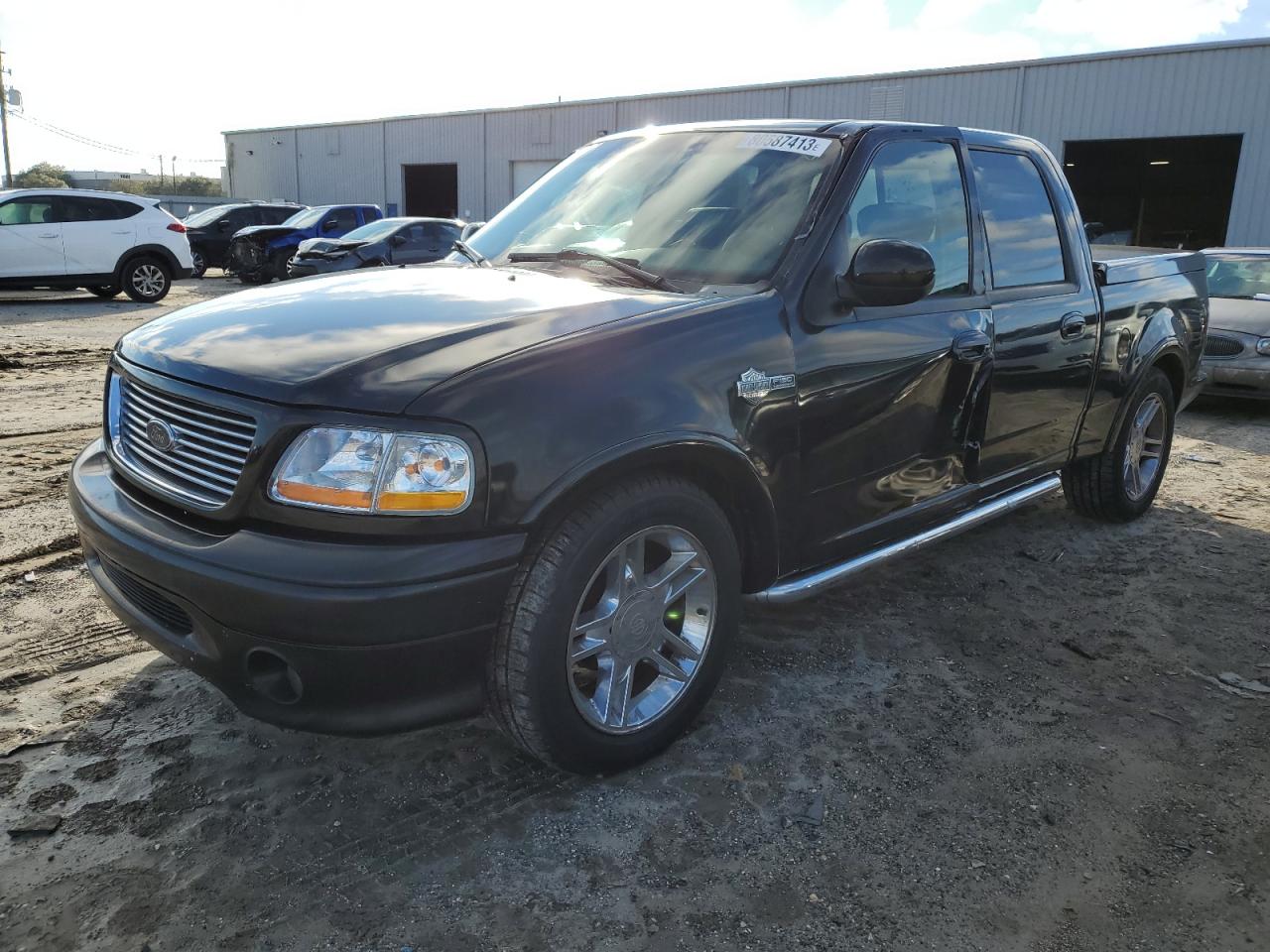 Image 1 of 2002 FORD F150 SUPERCREW HARLEY DAVIDSON 2002 with VIN 1FTRW07342KD27370