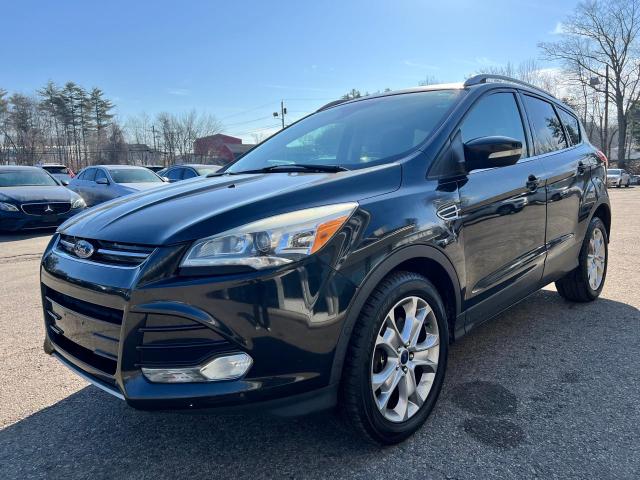 Изображение 2 2015 FORD ESCAPE TITANIUM 2015 с VIN 1FMCU9J98FUC09910