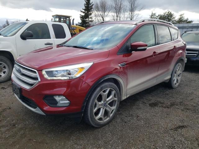 Image 1 of 2017 FORD ESCAPE TITANIUM 2017 with VIN 1FMCU9J97HUE58699