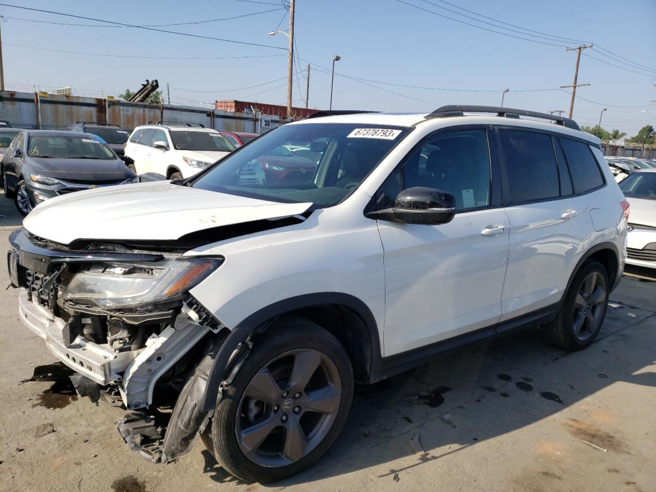 Изображение 1 Honda Passport Touring 2021 с VIN 5FNYF7H96MB005367