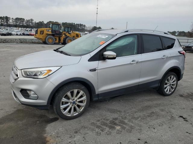 Obraz 1 z 2017 FORD ESCAPE TITANIUM 2017 z VIN 1FMCU0JD9HUC22877