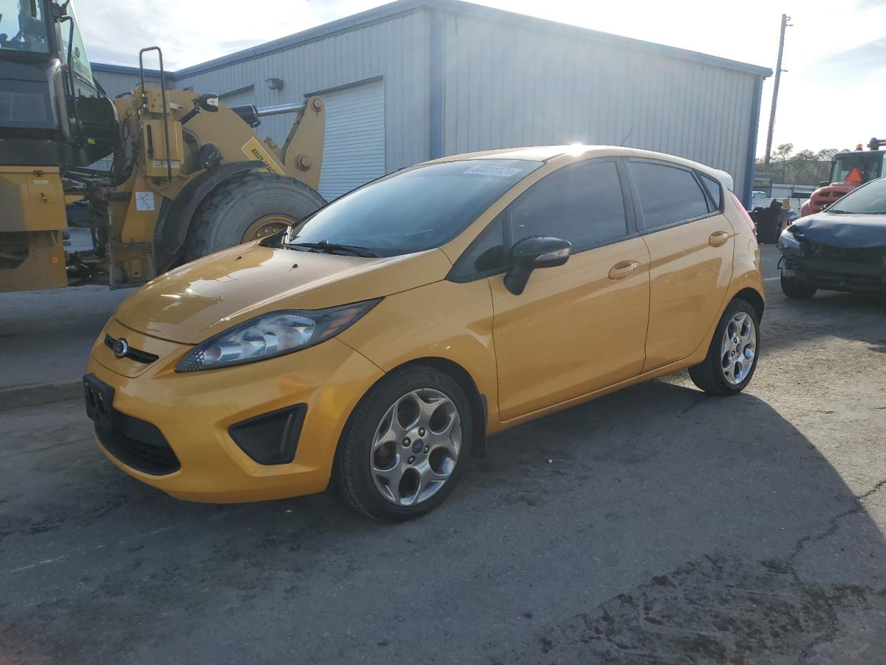 Image 1 of 2013 FORD FIESTA TITANIUM 2013 with VIN 3FADP4FJ4DM100051
