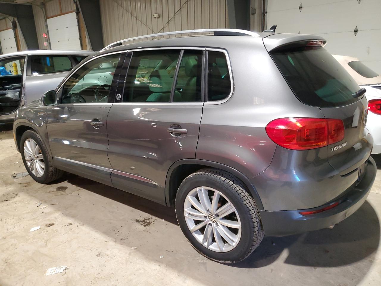 Image 2 of 2012 VOLKSWAGEN TIGUAN S 2012 with VIN WVGAV7AX0CW005903