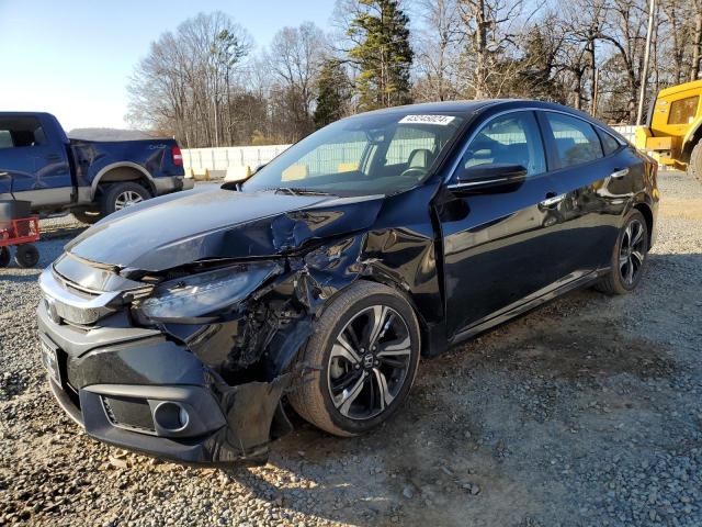 Obraz 1 z 2017 HONDA CIVIC TOURING 2017 z VIN 2HGFC1F95HH653039