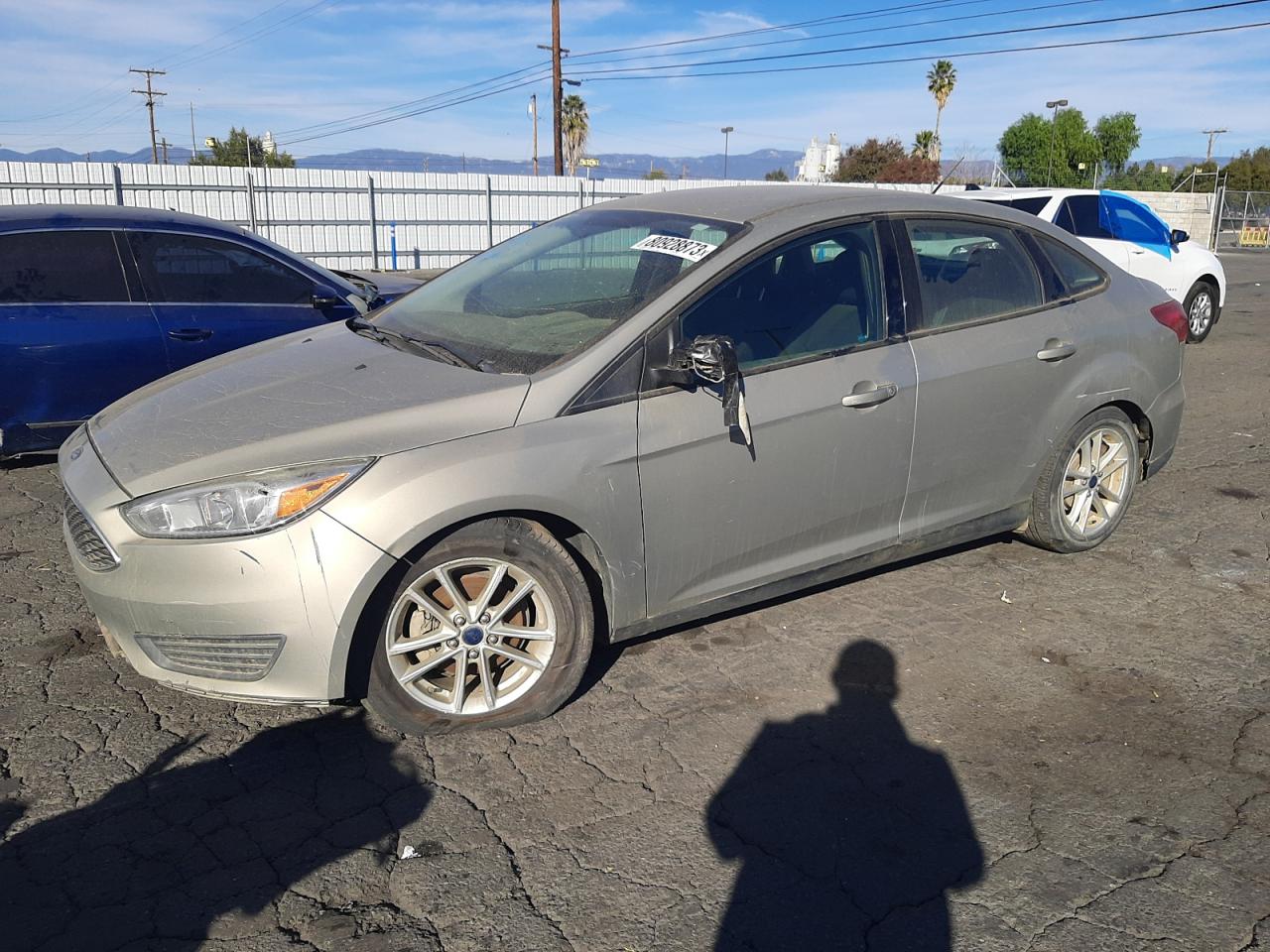 Obraz 1 z 2016 FORD FOCUS SE 2016 z VIN 1FADP3F25GL282061