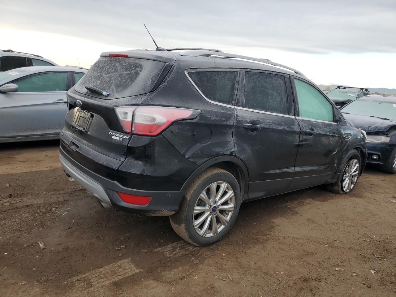 Изображение 3 2017 FORD ESCAPE TITANIUM 2017 с VIN 1FMCU9J90HUC38580