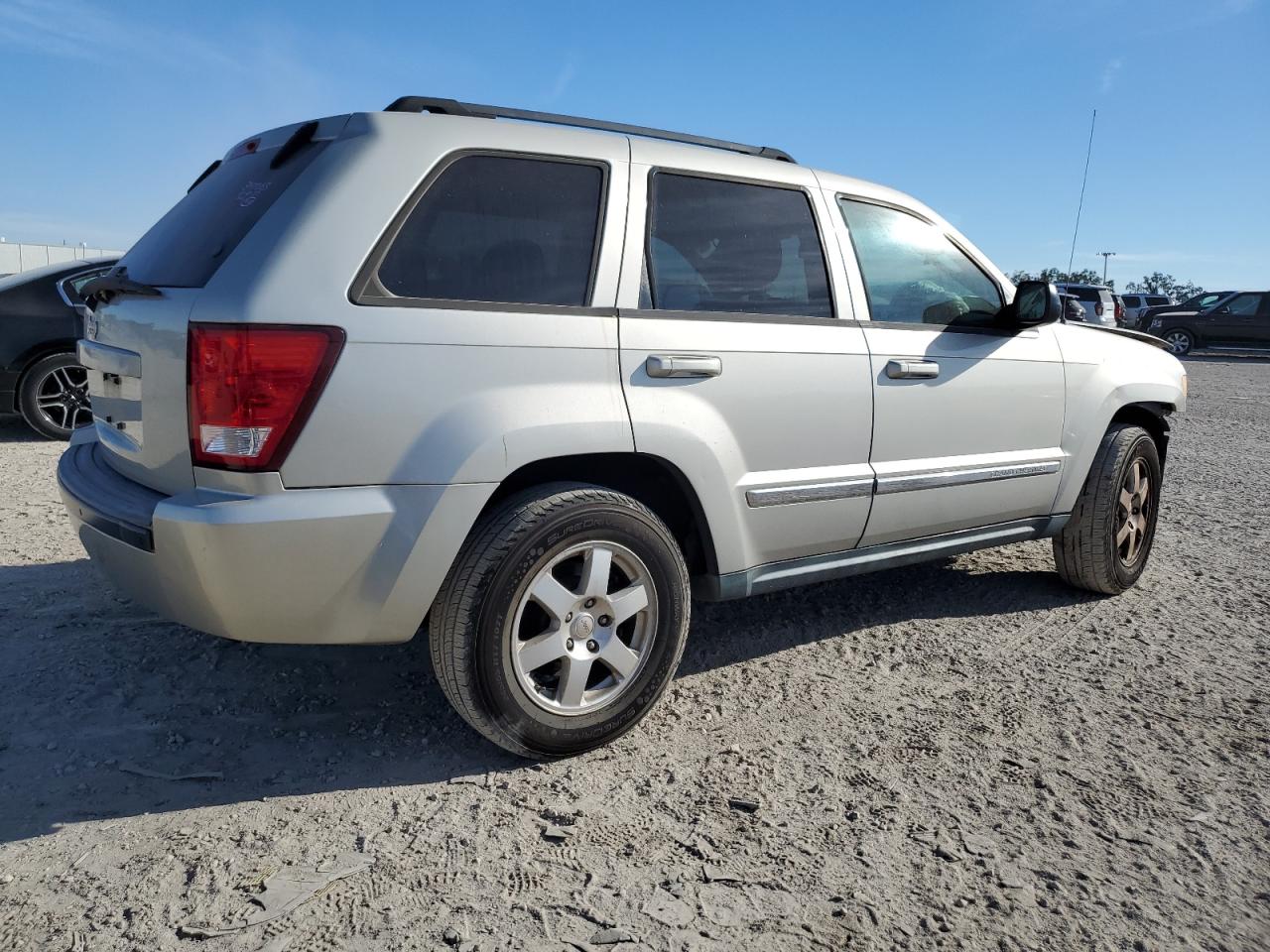 Image 3 of 2010 JEEP GRAND CHEROKEE LAREDO 2010 with VIN 1J4PS4GK1AC136848