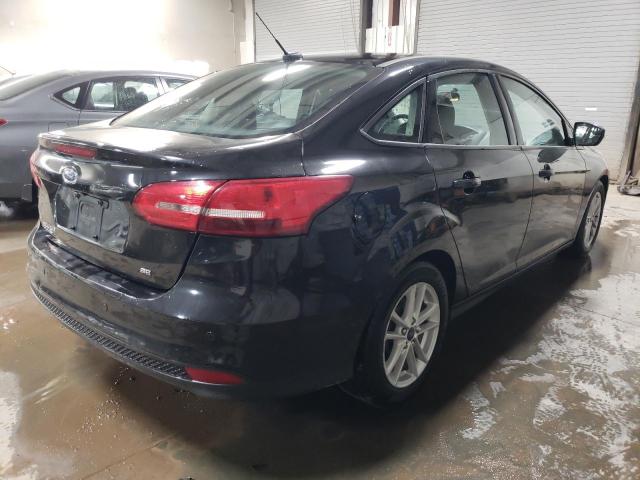 Image 3 of 2015 FORD FOCUS SE 2015 with VIN 1FADP3F26FL220909