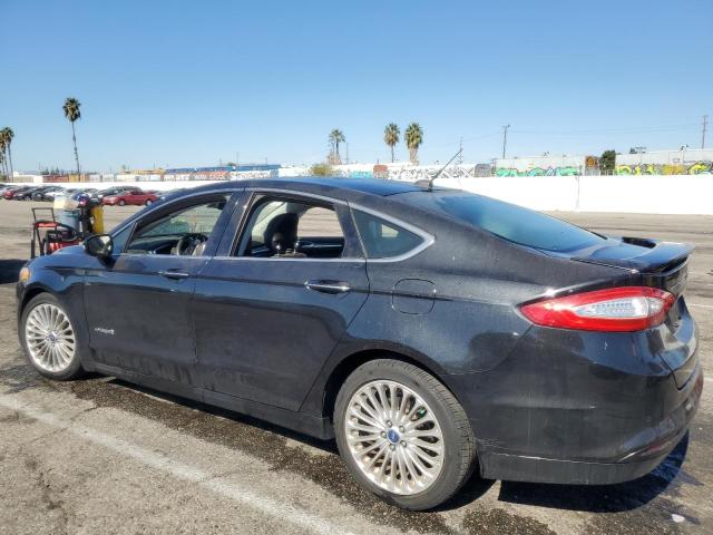 Obraz 2 z 2014 FORD FUSION TITANIUM HEV 2014 z VIN 3FA6P0RU5ER227760