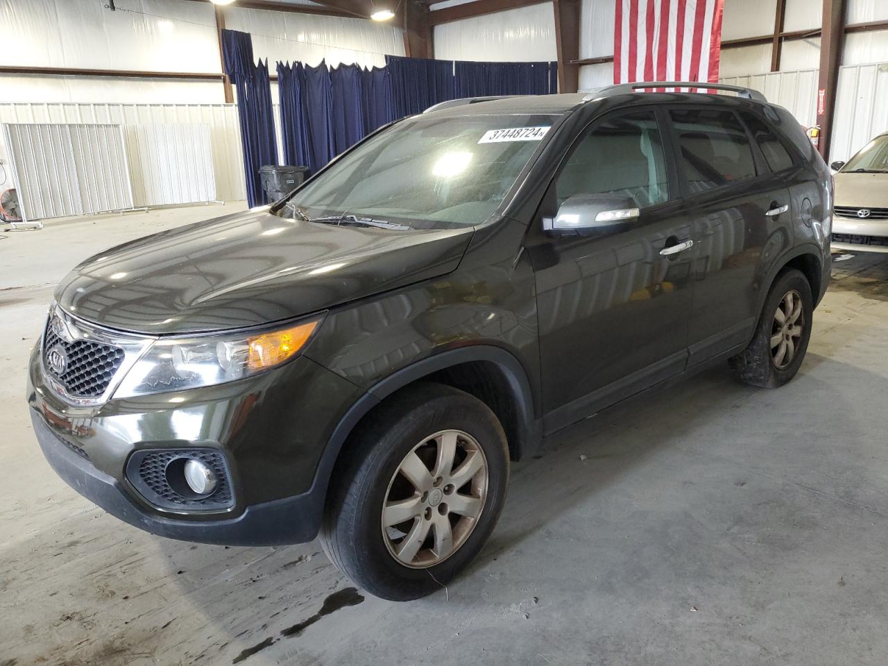Image 1 of 2011 KIA SORENTO BASE 2011 with VIN 5XYKT4A10BG105701