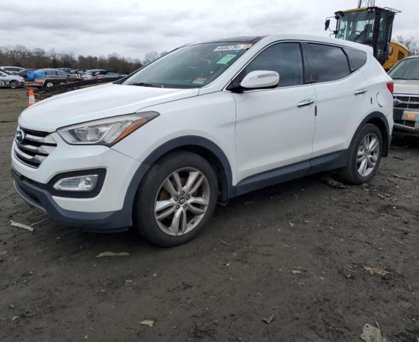 Image 1 of 2013 HYUNDAI SANTA FE SPORT  2013 with VIN 5XYZWDLA9DG038179