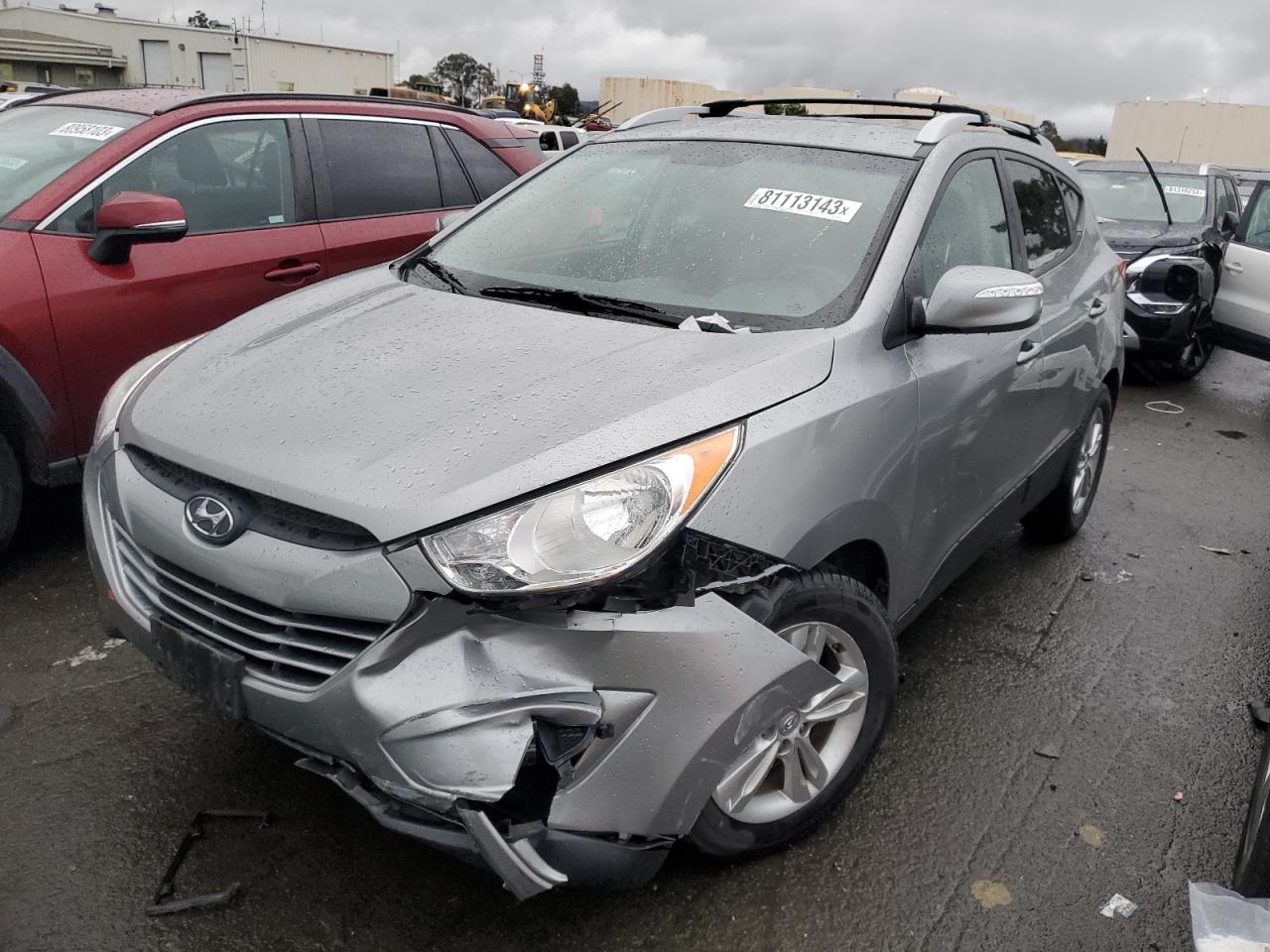 Image 1 of 2012 HYUNDAI TUCSON GLS 2012 with VIN KM8JU3AC5CU328820