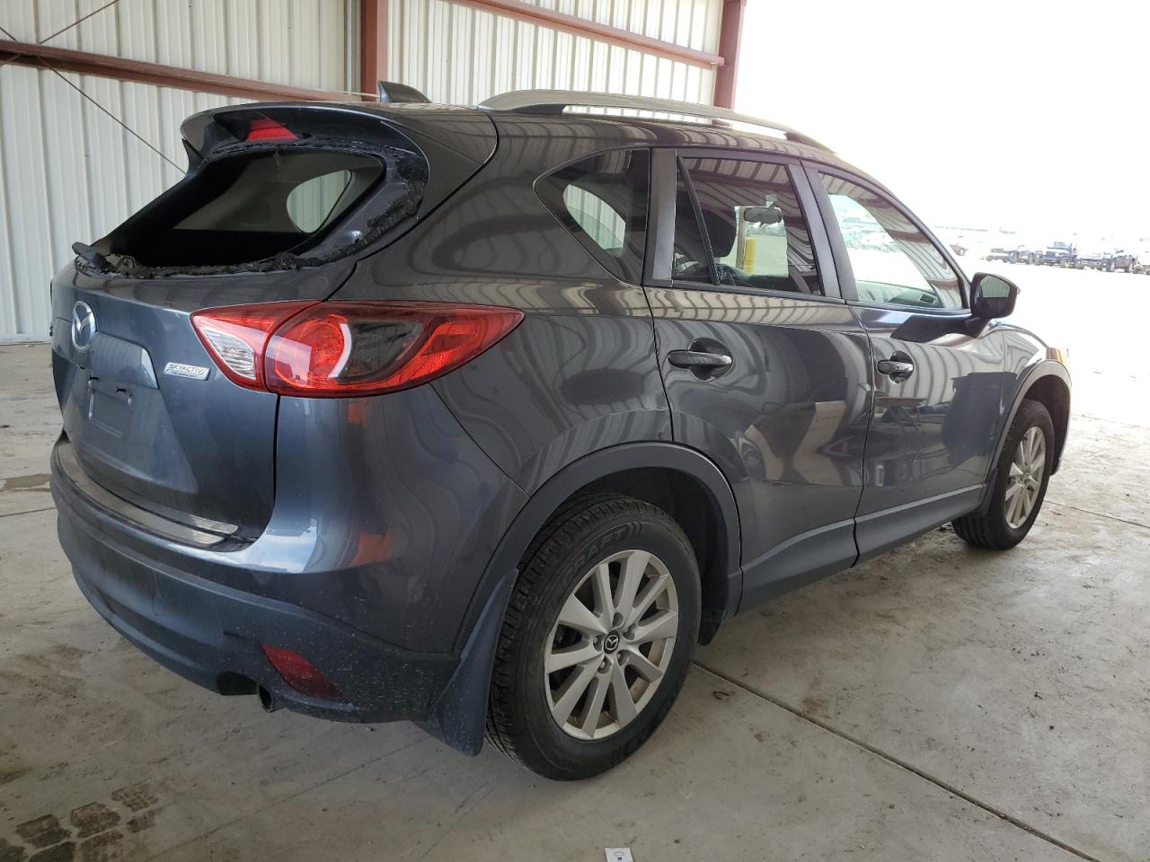 Image 3 of Mazda Cx-5 Touring 2015 with VIN JM3KE2CYXF0494648