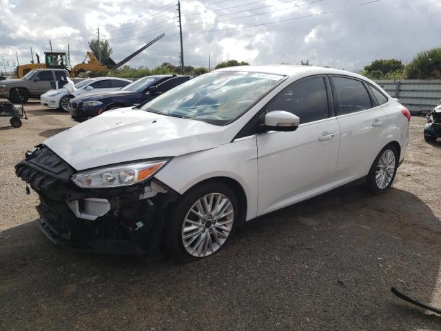 Image 1 of 2017 FORD FOCUS TITANIUM 2017 with VIN 1FADP3J28HL266302