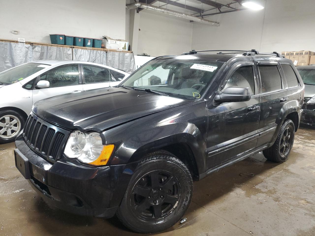 Image 1 of 2010 JEEP GRAND CHEROKEE LAREDO 2010 with VIN 1J4PR4GK5AC100379