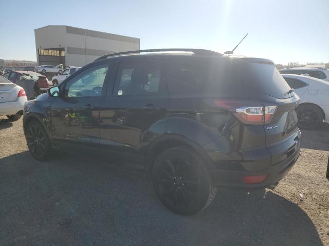 Изображение 2 2017 FORD ESCAPE TITANIUM 2017 с VIN 1FMCU9J9XHUA04057