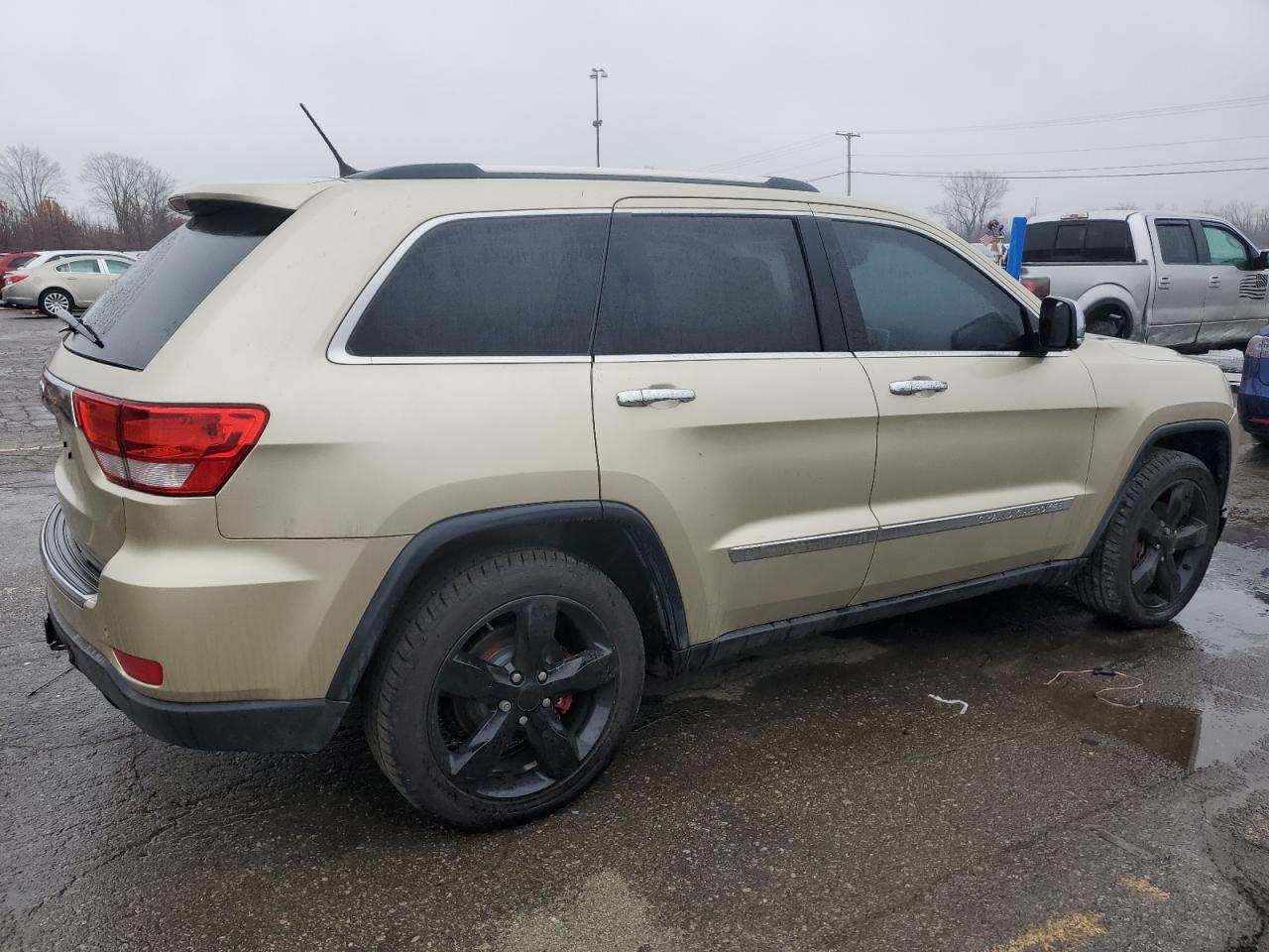 Image 3 of 2011 JEEP GRAND CHEROKEE OVERLAND 2011 with VIN 1J4RR6GG3BC657762