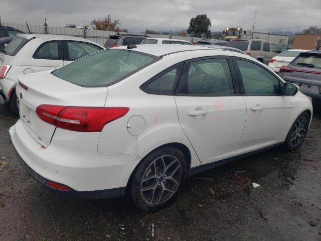 Obraz 3 z 2017 FORD FOCUS SEL 2017 z VIN 1FADP3H23HL304069