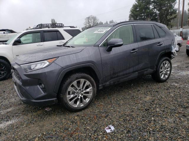 Image 1 of 2021 TOYOTA RAV4 XLE PREMIUM 2021 with VIN JTMA1RFV5MJ039899
