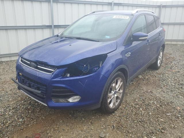 Obraz 1 z 2014 FORD ESCAPE TITANIUM 2014 z VIN 1FMCU9J90EUD99121