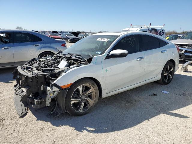 Obraz 1 z 2017 HONDA CIVIC TOURING 2017 z VIN 2HGFC1F90HH634432