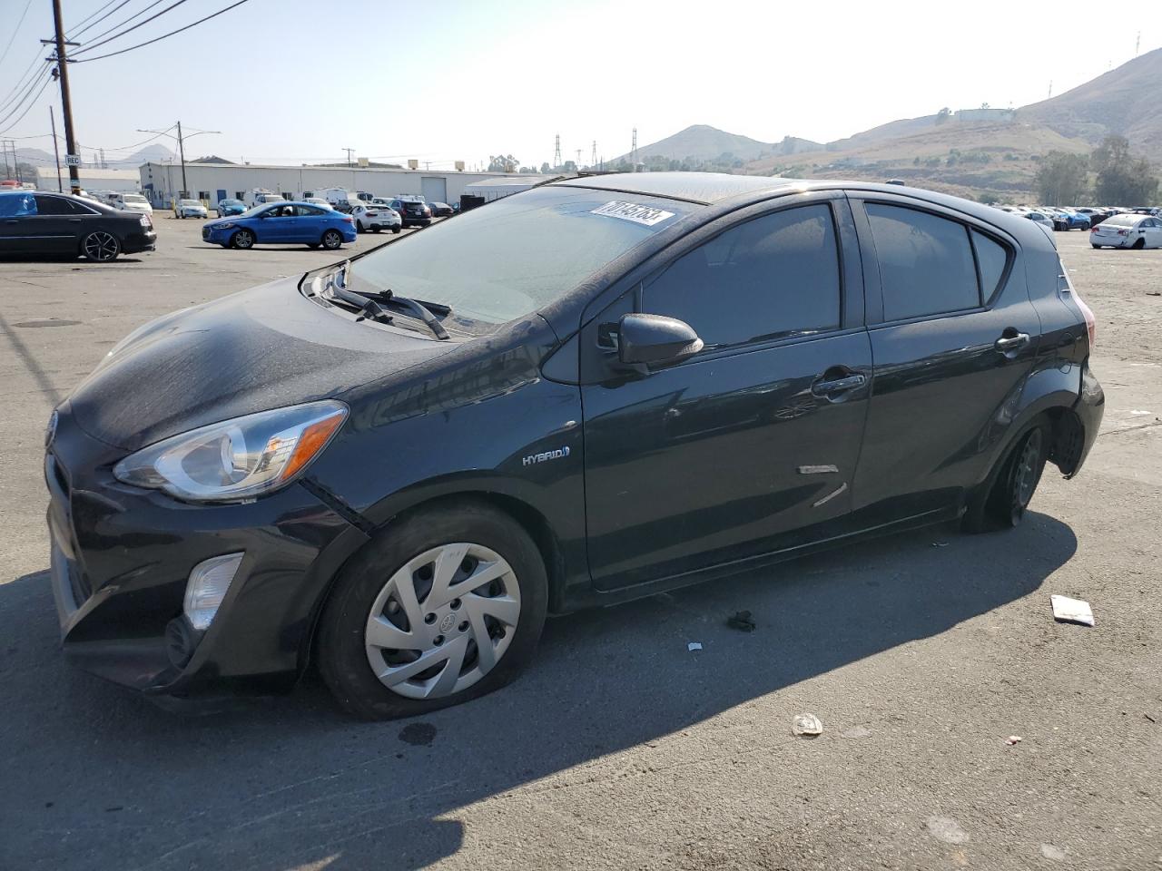 Image 1 of 2015 TOYOTA PRIUS C  2015 with VIN JTDKDTB3XF1090573