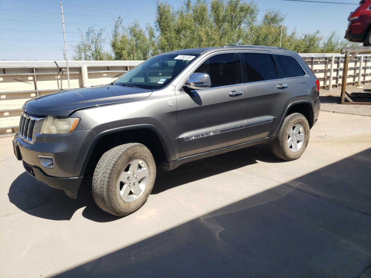 Image 1 of 2013 JEEP GRAND CHEROKEE LAREDO 2013 with VIN 1C4RJFAG2DC583470