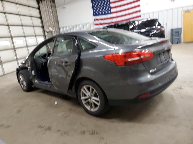 Изображение 2 2016 FORD FOCUS SE 2016 с VIN 1FADP3F21GL232077