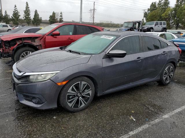 Obraz 1 z 2016 HONDA CIVIC EX 2016 z VIN 2HGFC1F39GH647142