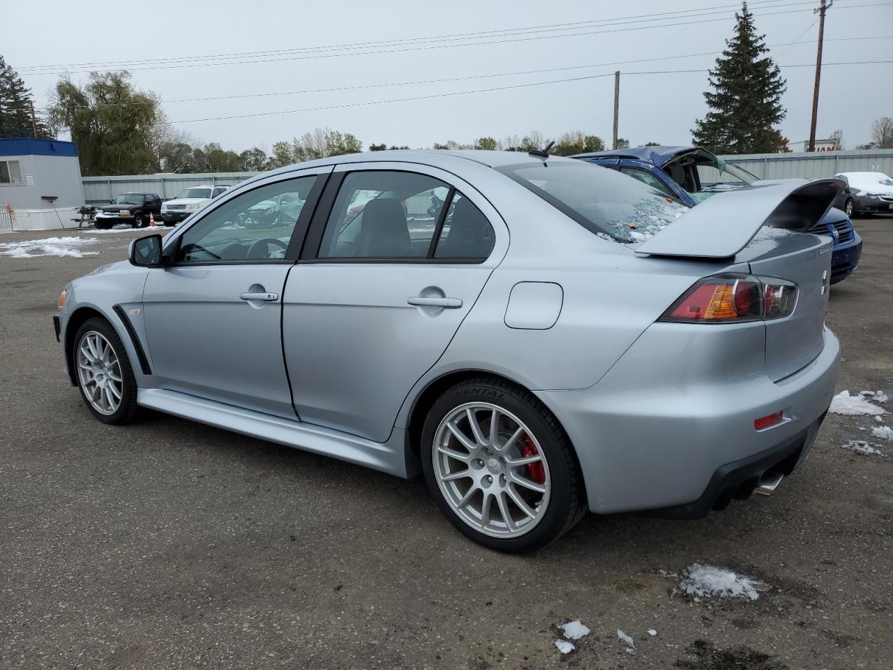 Obraz 2 z 2014 MITSUBISHI LANCER EVOLUTION GSR 2014 z VIN JA32W8FV9EU020531